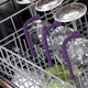 The main reason you’re supposed to hand wash your wine glasses is that they can fall over in the dishwasher and break. Quirky’s Tethers fix that.